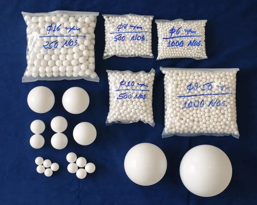 Virgin PTFE balls in standard metric sizes from 6 mm to 16 mm — bagged stock and loose samples at Hemsun Engg. Industries